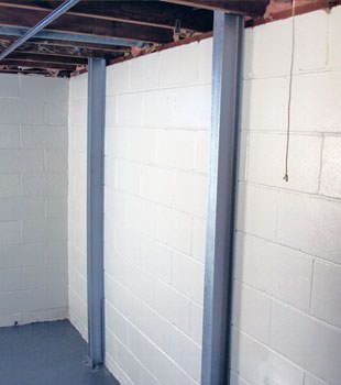 A PowerBrace™ i-beam foundation wall repair system in Montreal