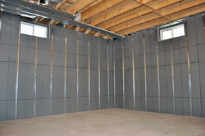 Insulating and finishing basement walls